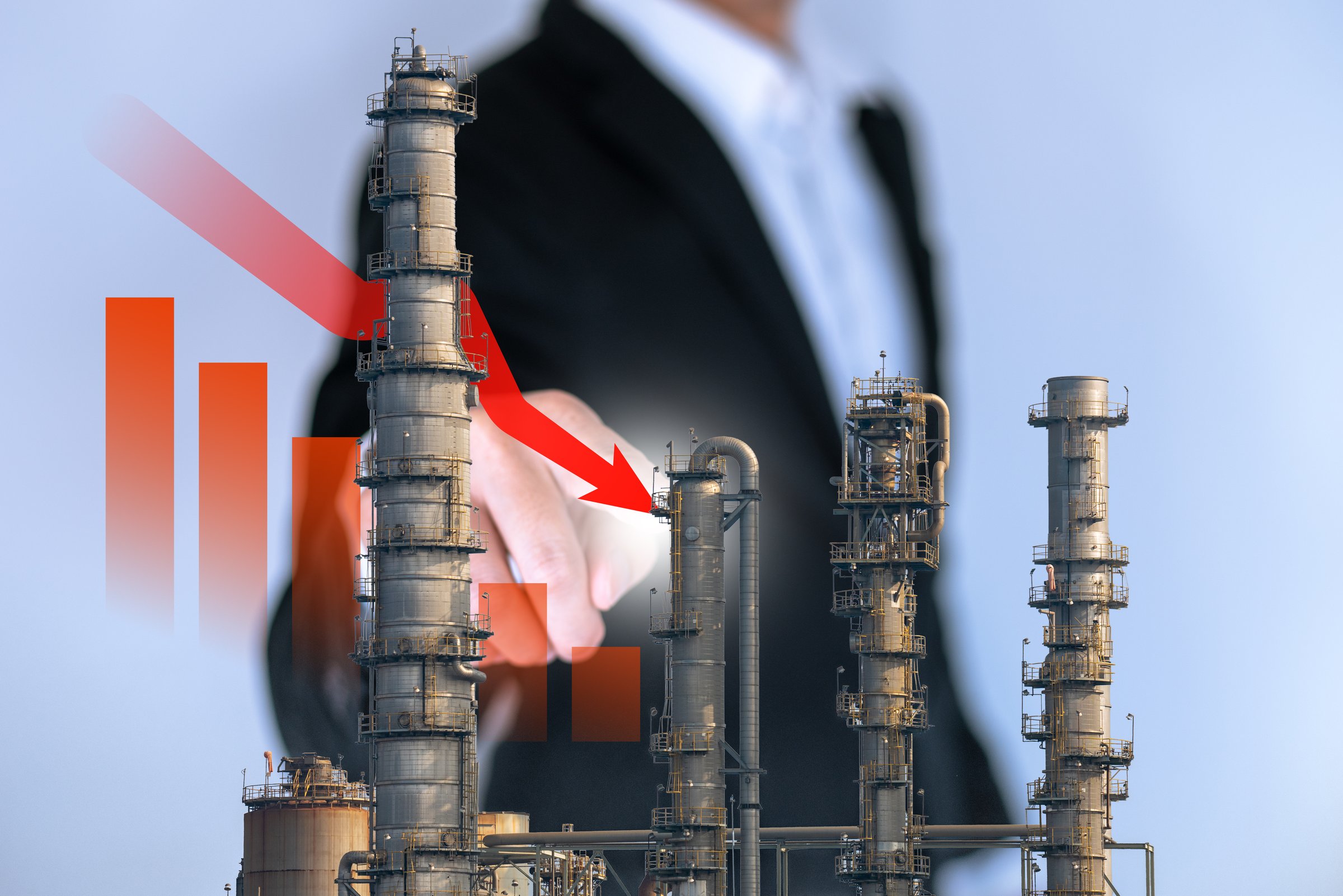 Business man with floating icon show downtrend of petrochemical industrial.