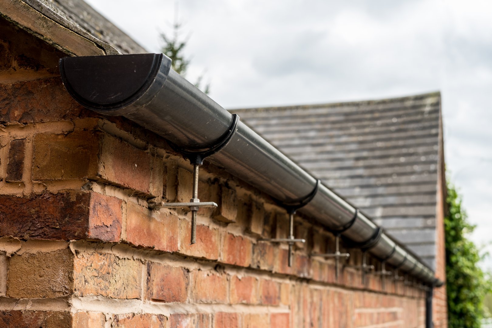 Corner of the house with gutter