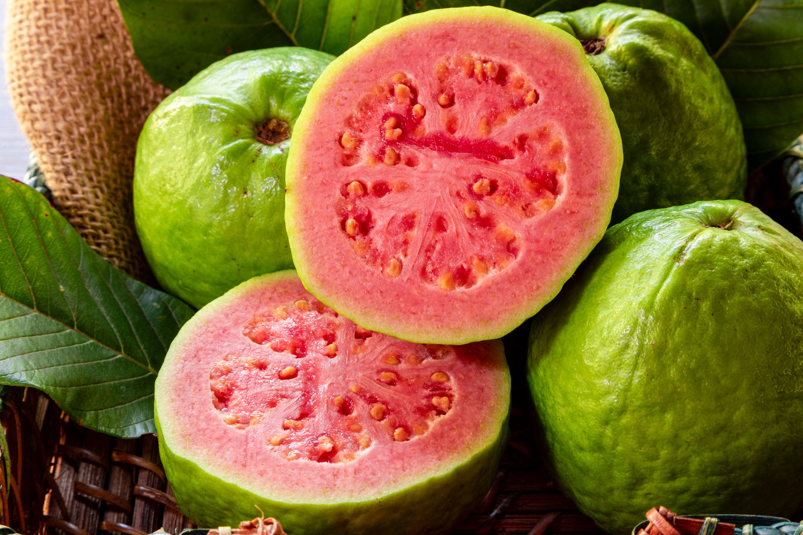 Closeup of a red guava cut in half
