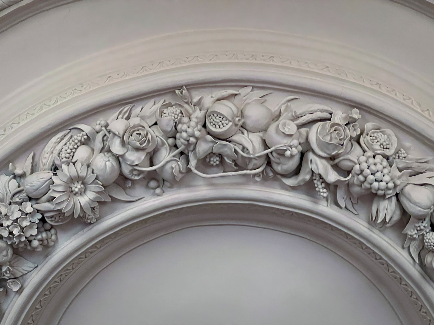 Intricate fruit and flower plaster work