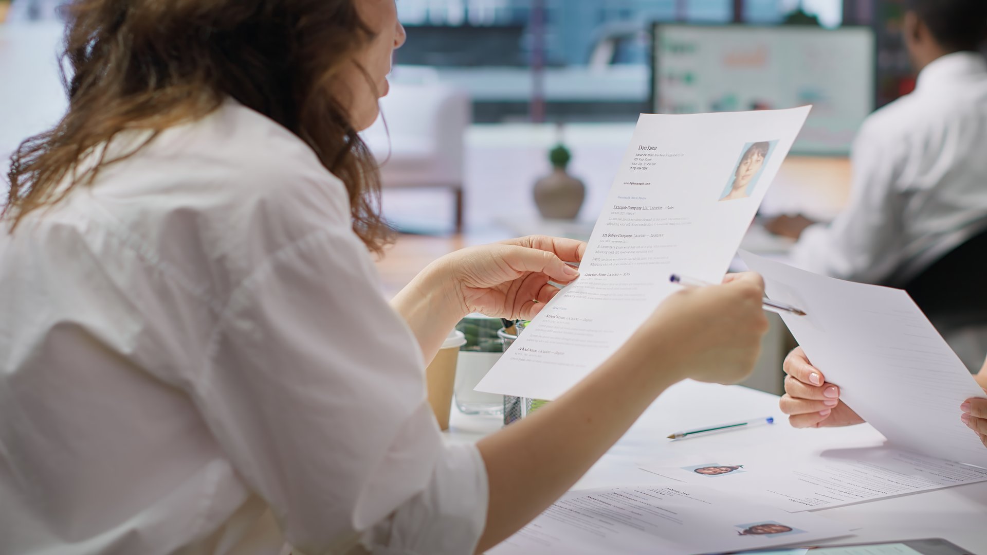 Team of recruiters working together to choose the right applicant with the best qualifications to fill in the vacancy. HR experts selecting candidates based on their resume, job offer. Camera A.
