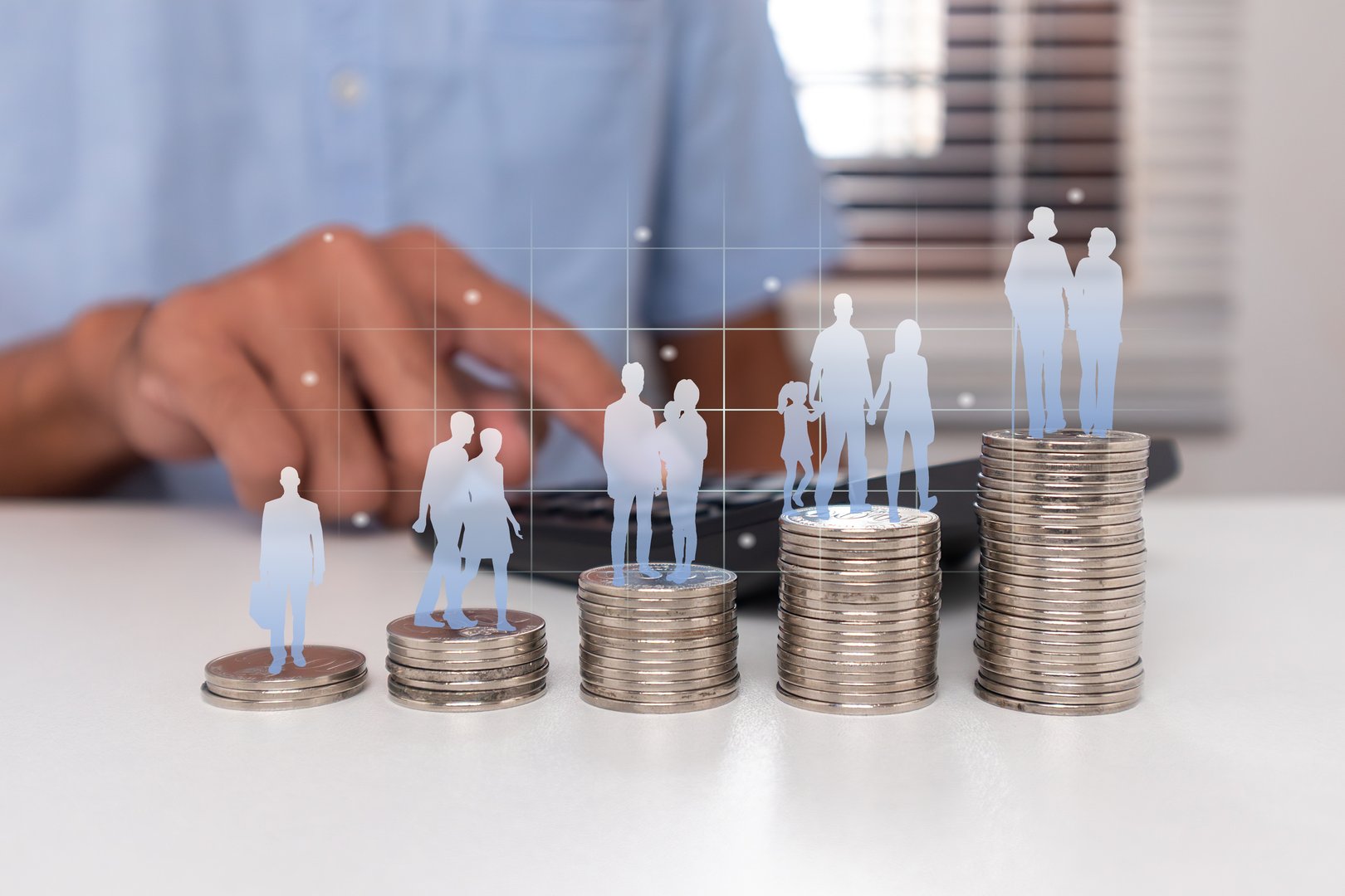 Human life cycle on stack of coins to prepare a pension fund. A man saving money for retirement planning concept.