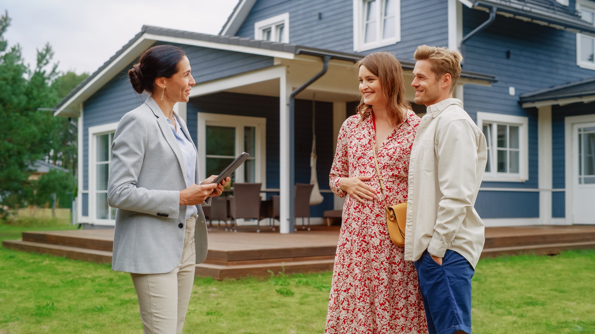 Young Couple Visiting a Potential New Home Property