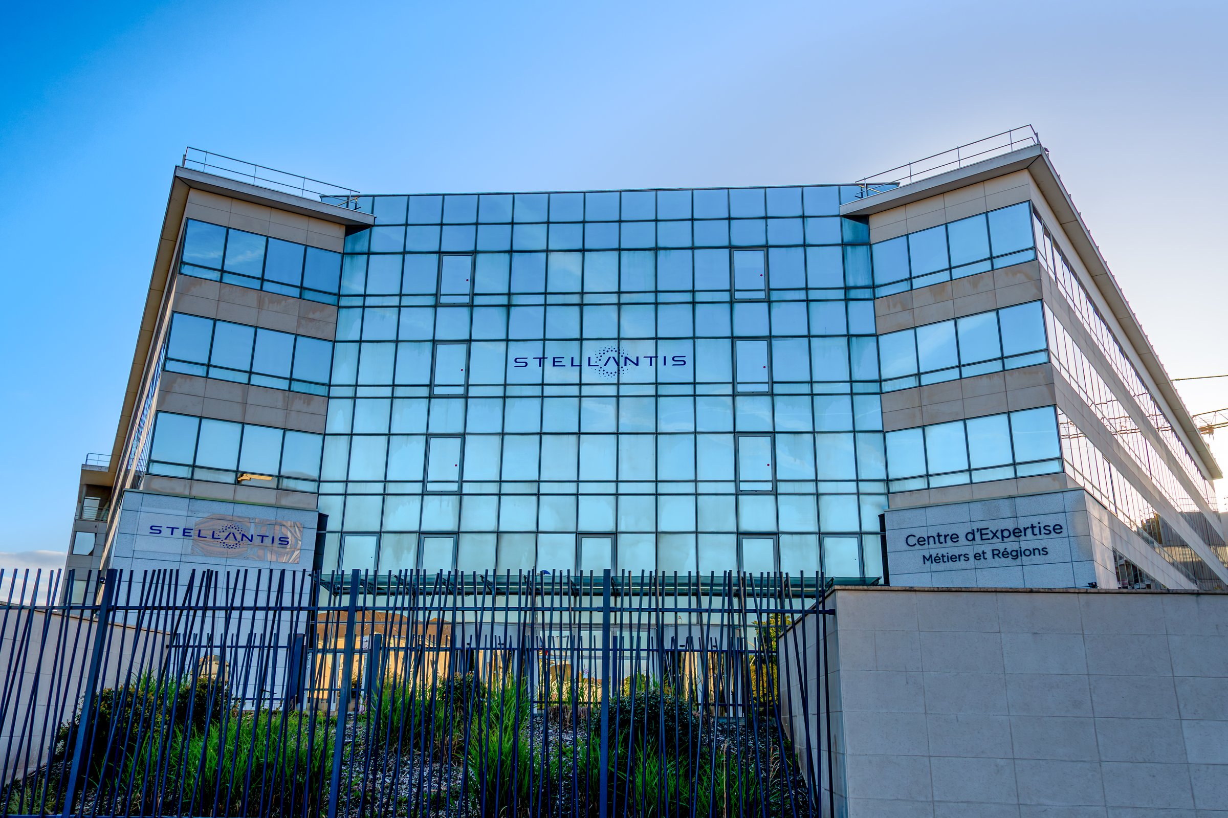 Poissy, France - April 21, 2024: Exterior view of the French headquarters of Stellantis. Stellantis is a multinational automobile group resulting from the merger of the PSA and Fiat Chrysler groups
