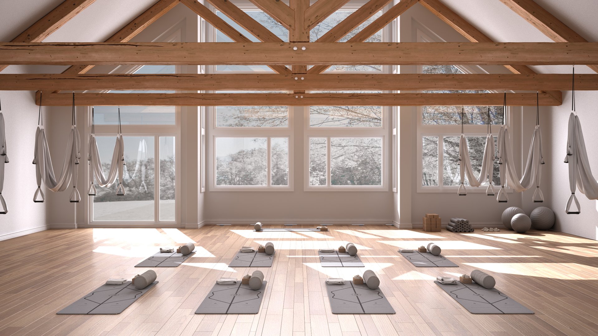 Empty yoga studio interior design, space with hammock, mats, pillows and accessories, wooden floor and roof, ready for yoga practice, meditation, panoramic window with winter panorama