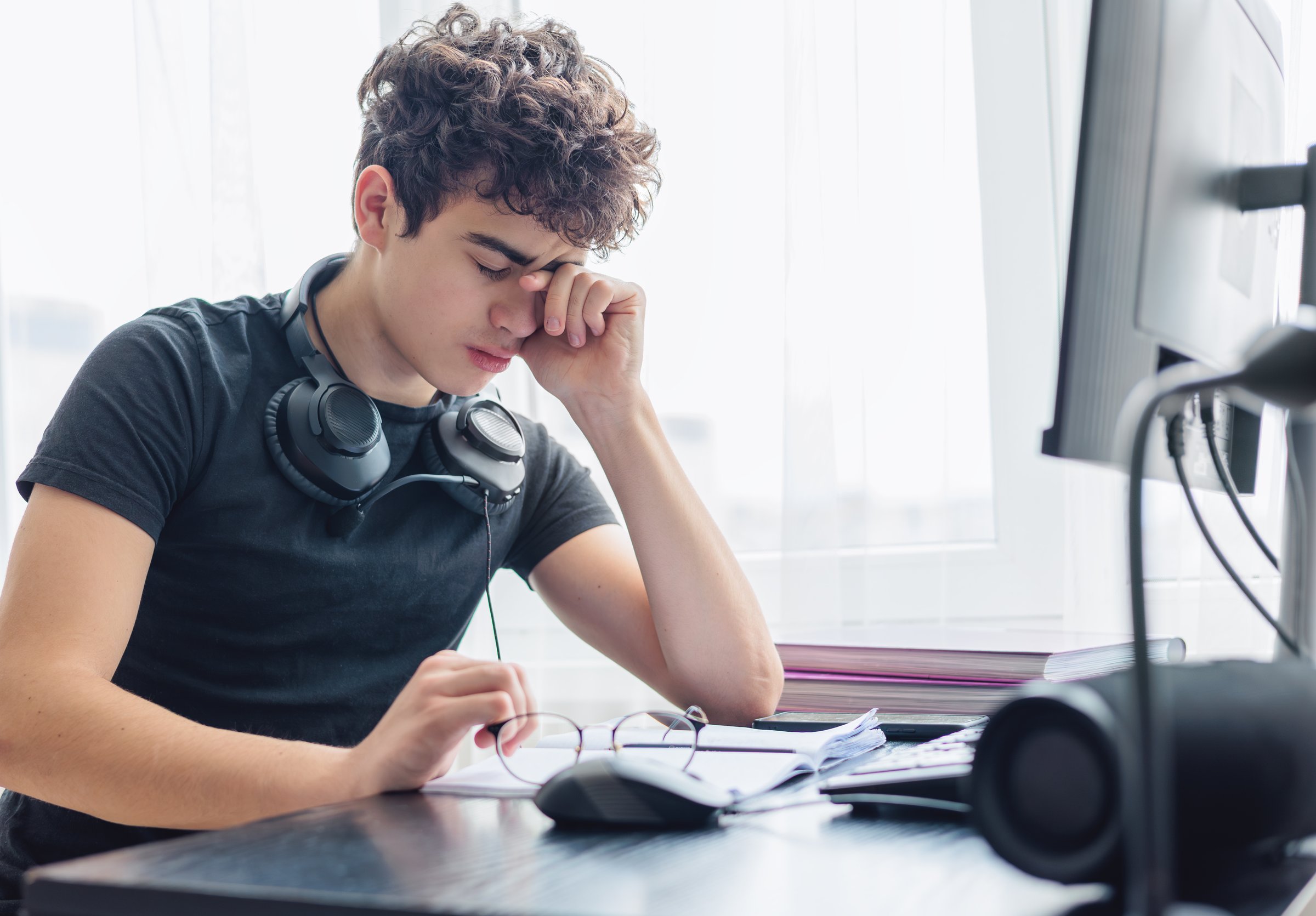 Stressed Out Student. Study Burnout. Overwhelmed. Anxiety. Mental Fatigue. onlinelearning. Overwhelmed Teenager Struggling with Studying and Exam Stress. Learning Difficulties, ADHD, Autism. Copyspace