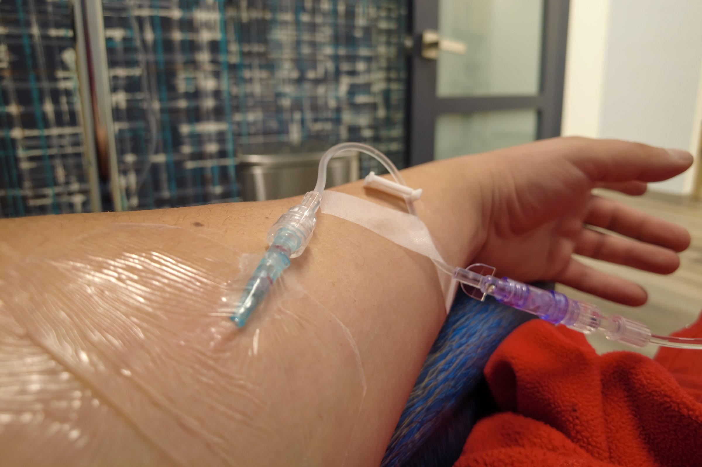 Patient Receiving Medical Treatment Through Intravenous Therapy
