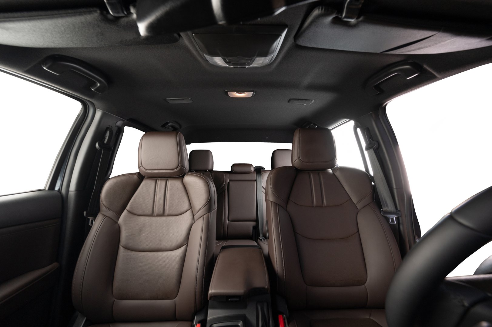 Front brown leather car seats interior with white isolated windows