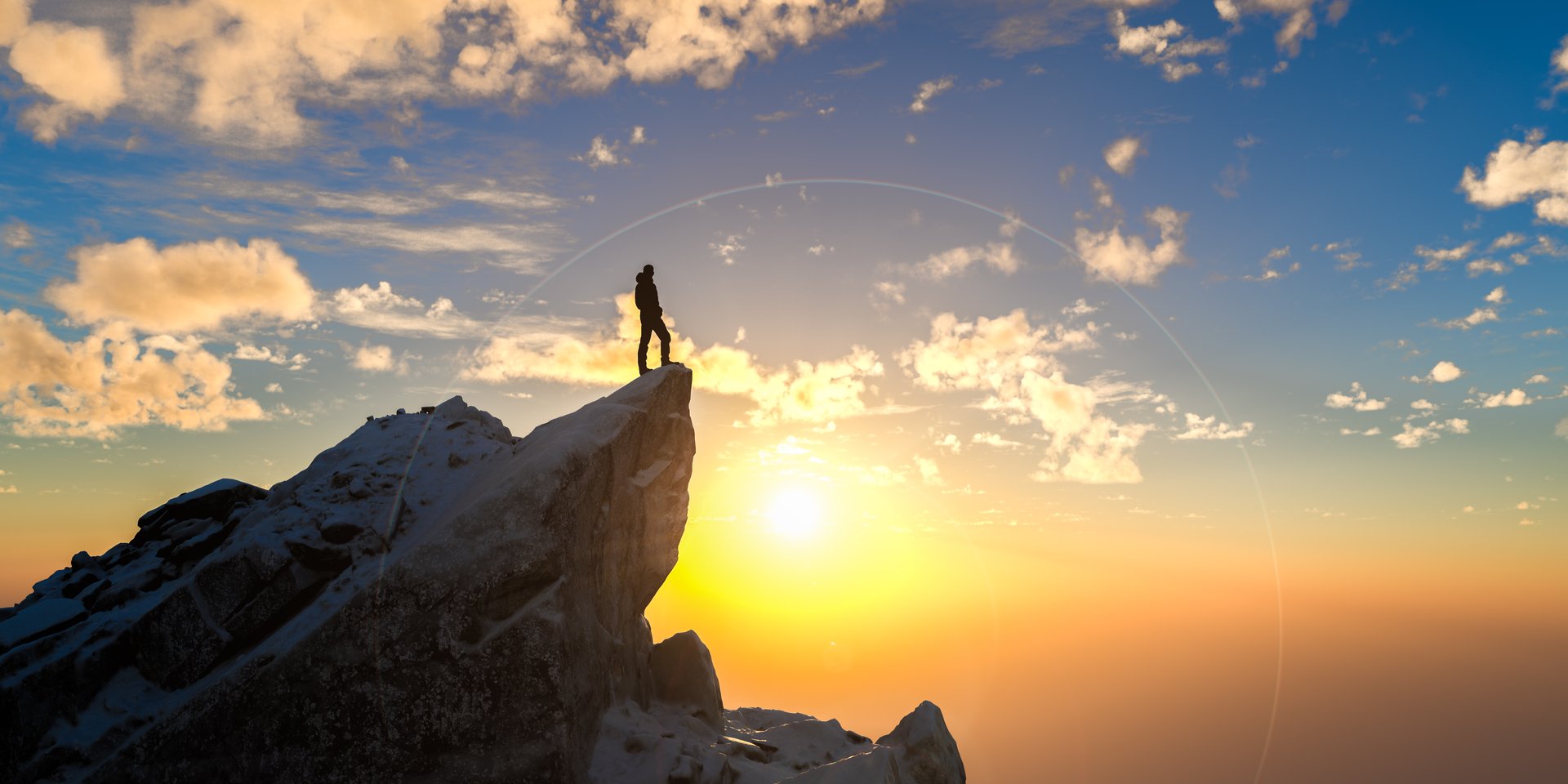 Hiker reaching mountain summit at dawn embracing freedom and victory, representing courage goal perseverance challenge growth exploration independence mindset