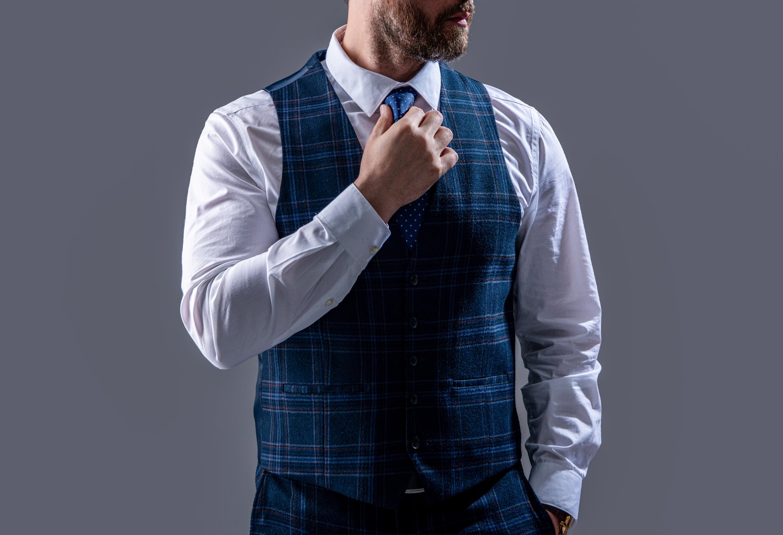 businessman in formalwear isolated on grey studio background. businessman wearing formalwear in studio. photo of businessman wear formalwear. businessman in formalwear suit.