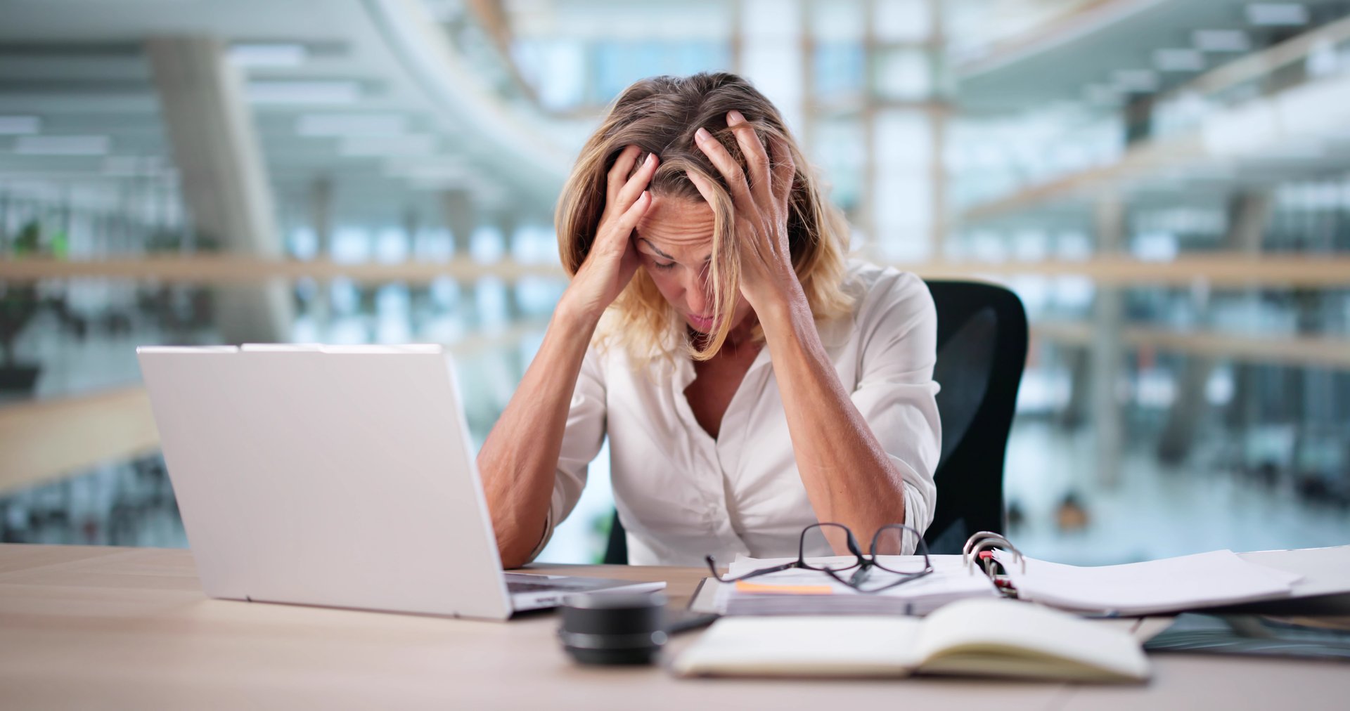 Frustrated Accountant Woman Working At Computer Desk
