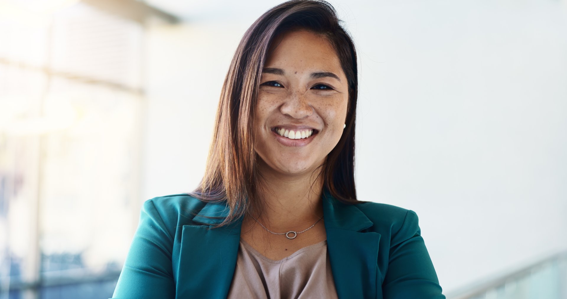 Happy, confident and portrait of businesswoman in lobby for corporate finance conference. Smile, pride and face of Asian female financial manager at seminar for investment proposal in workplace.