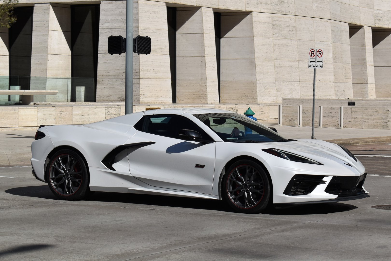 Houston, TX USA 9-28-2024 - A Chevrolet Corvette Stingray sports car cruising in the downtown financial district of Houston.