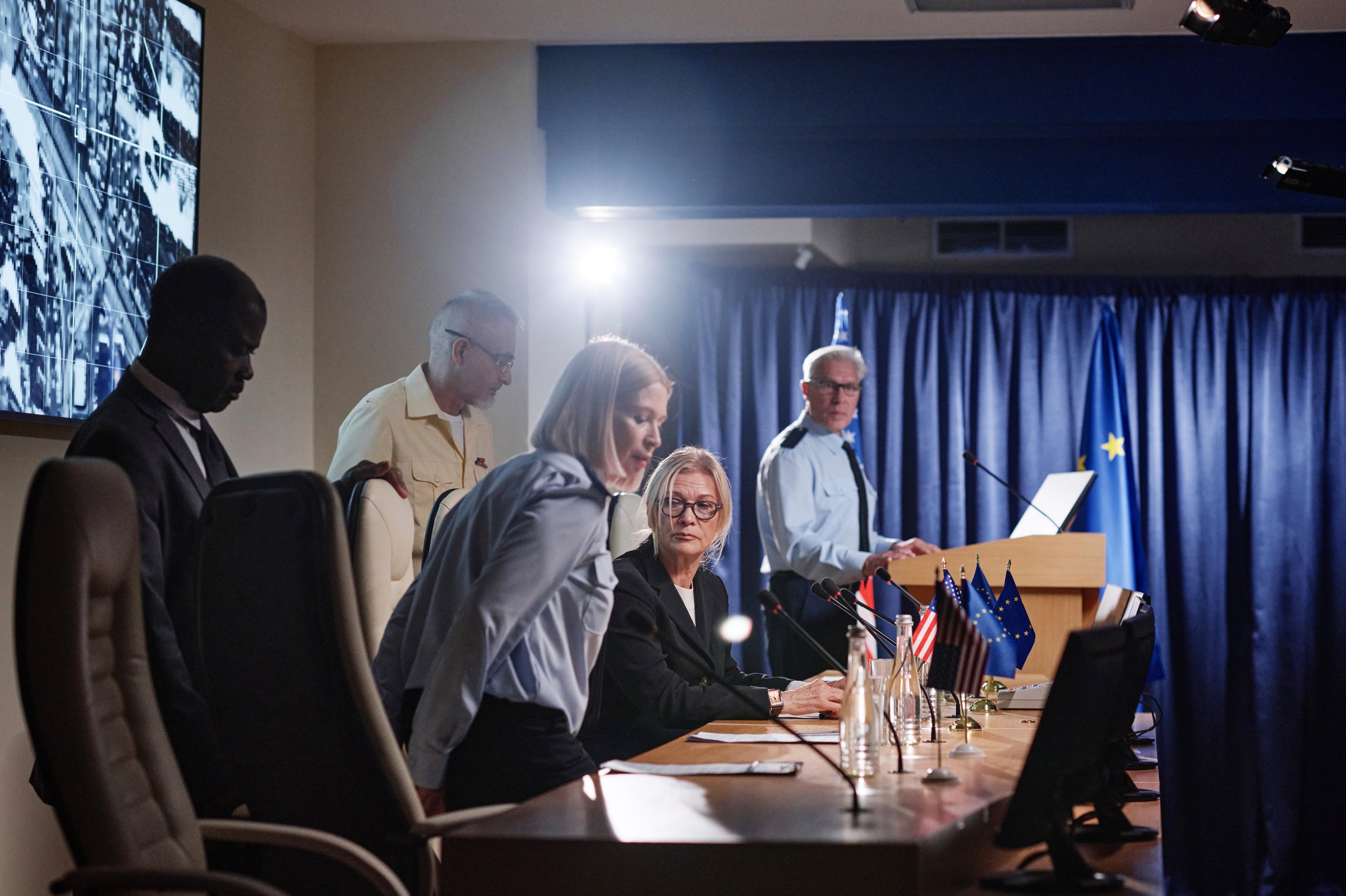 People discussing questions at conference