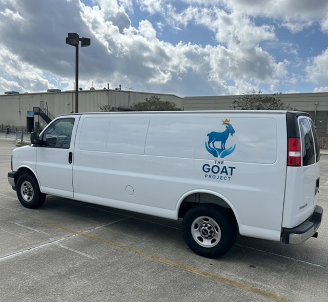 GOAT Project team escorting clients to local food bank