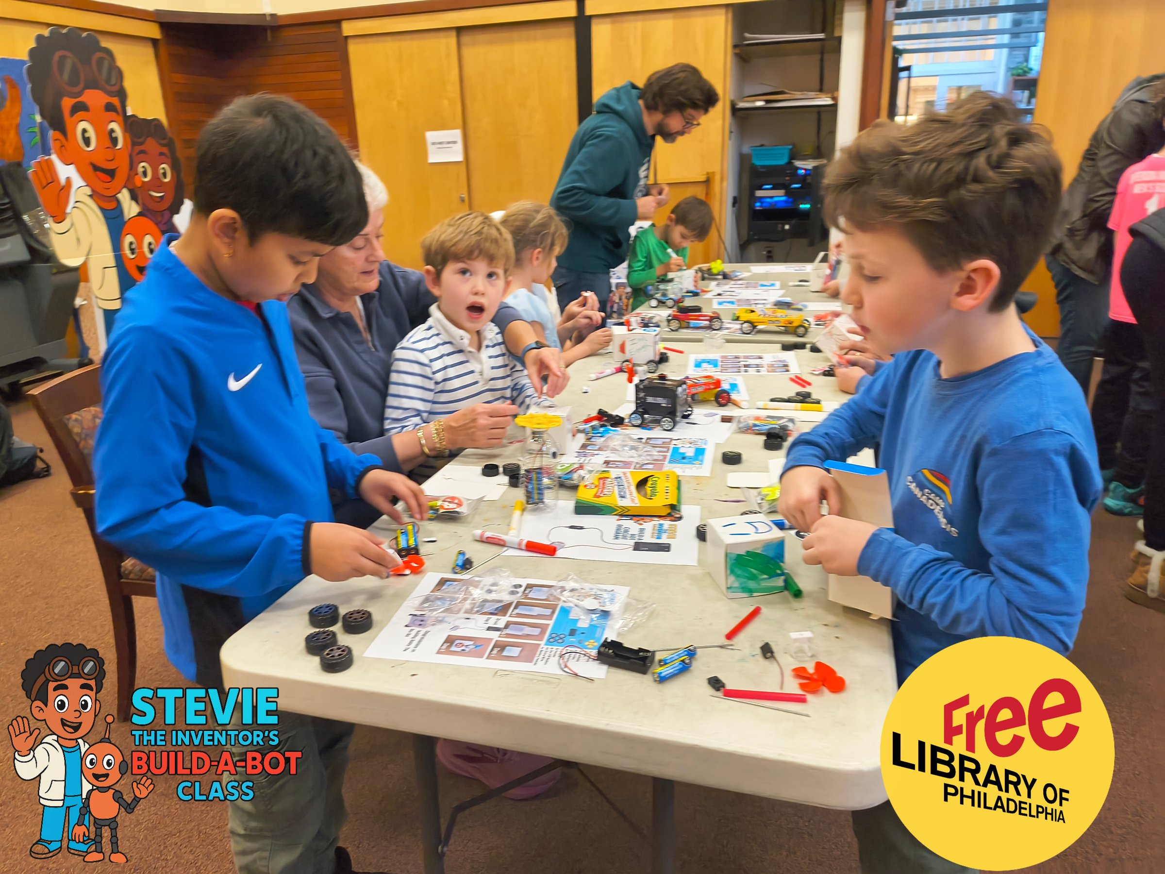 Students in robot building class