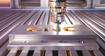 Cnc milling machine engraving the acronym cnc on a metal plate, concept of computer numerical control machining