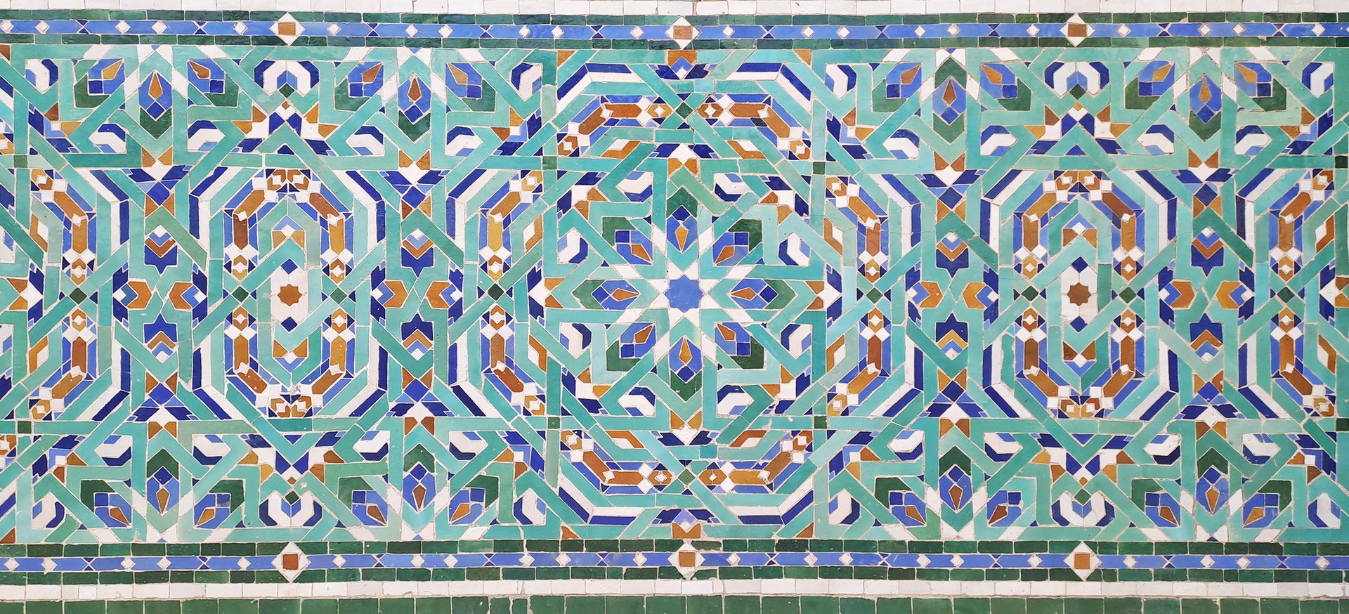 Traditional islamic moroccan zellige tile mosaic creating an intricate geometric pattern
