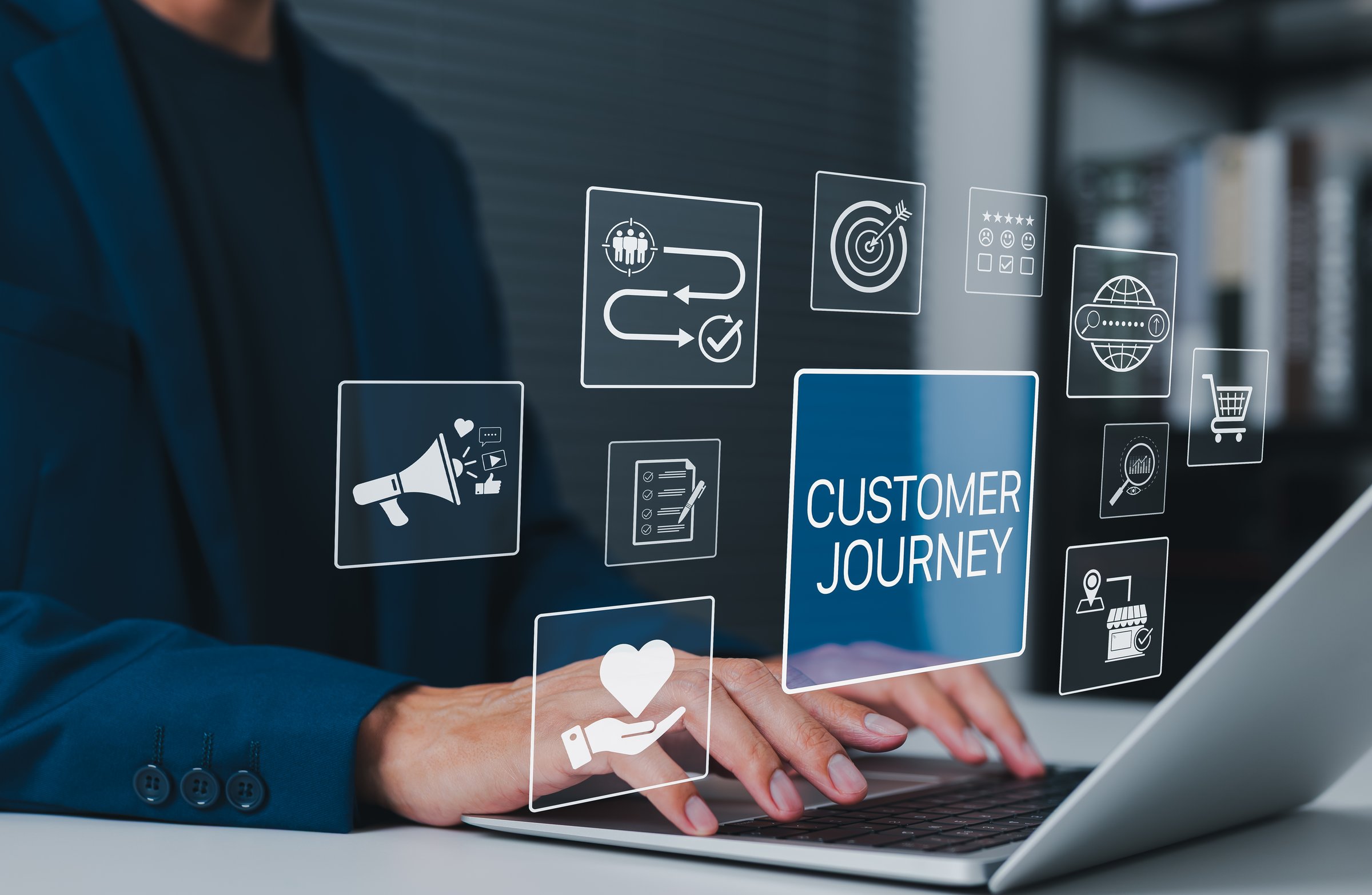 Customer journey and marketing funnel strategy concept. Person using laptop with icon customer journey, digital marketing, customer experience, feedback, social media, conversion, and brand engagement