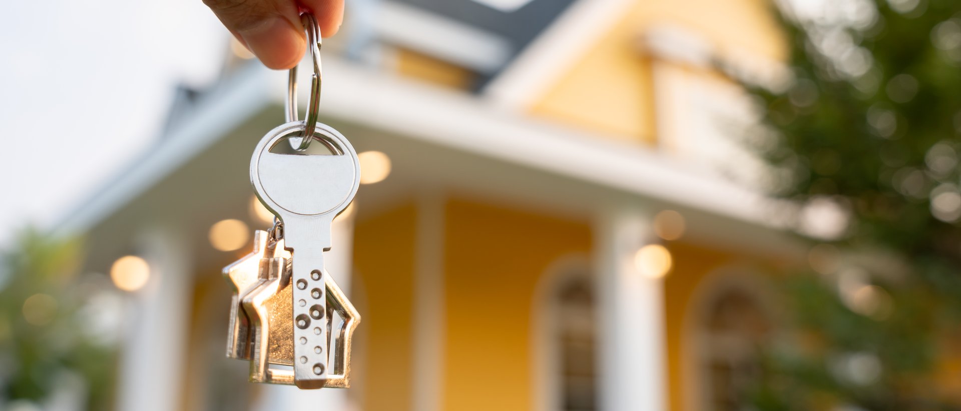 lease, rental and selling home. Real estate agent hold key for new house or realestate. rent house, Sales, loan credit financial, insurance, Seller, dealer, installment,  buy, sell, move in