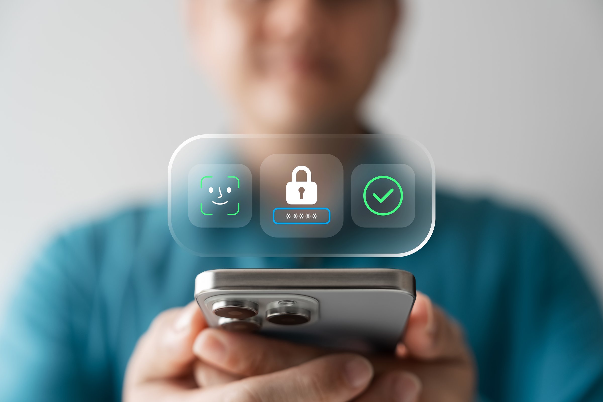 mobile security with face recognition, password protection, and biometric authentication. Man holding smartphone showing digital login and access verification interface.