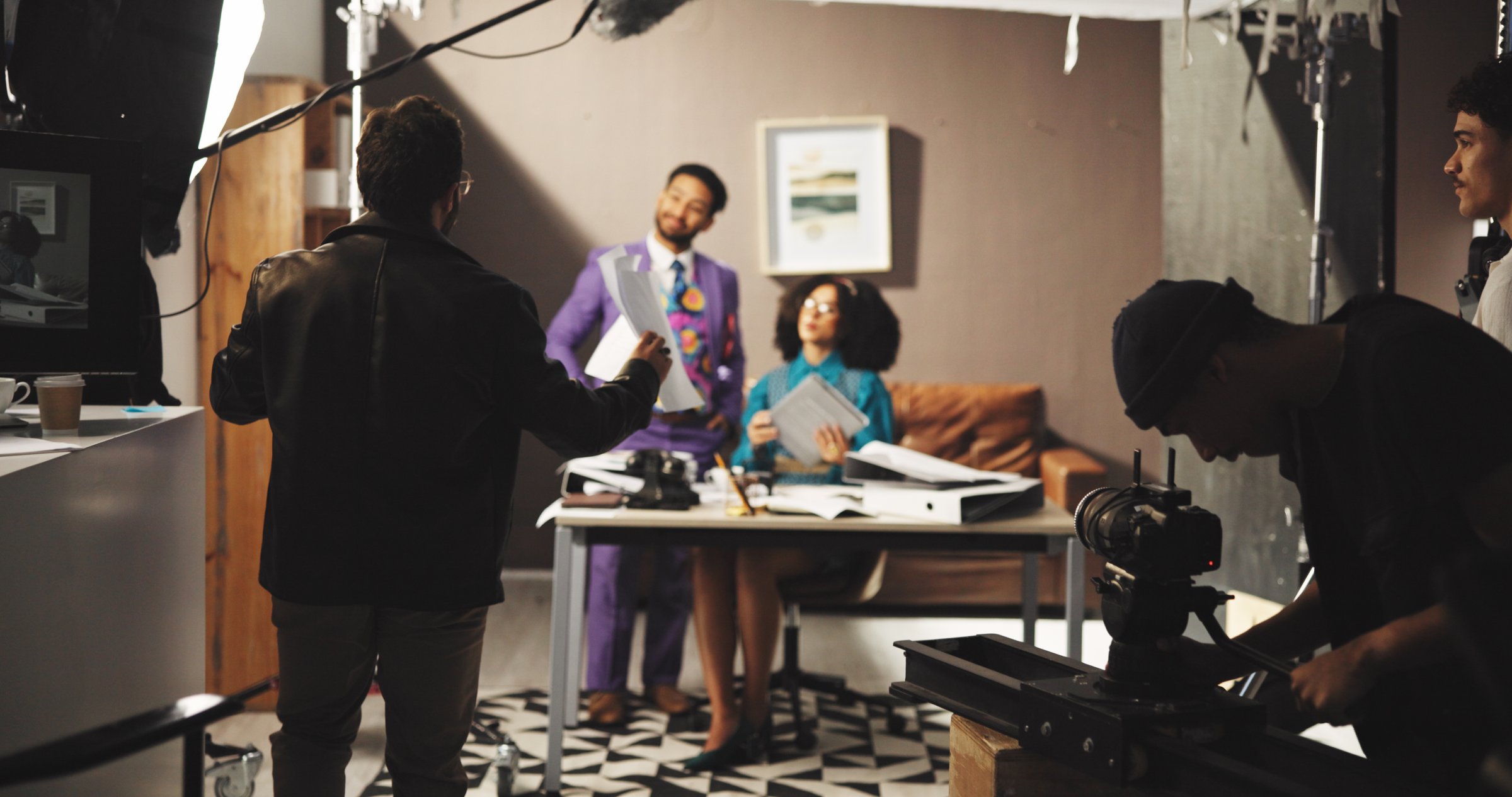 Director, film and production with talent on set for casting, rehearsal or videography instructions. Acting, behind the scenes and recording with people in studio for direction, discussion or shoot