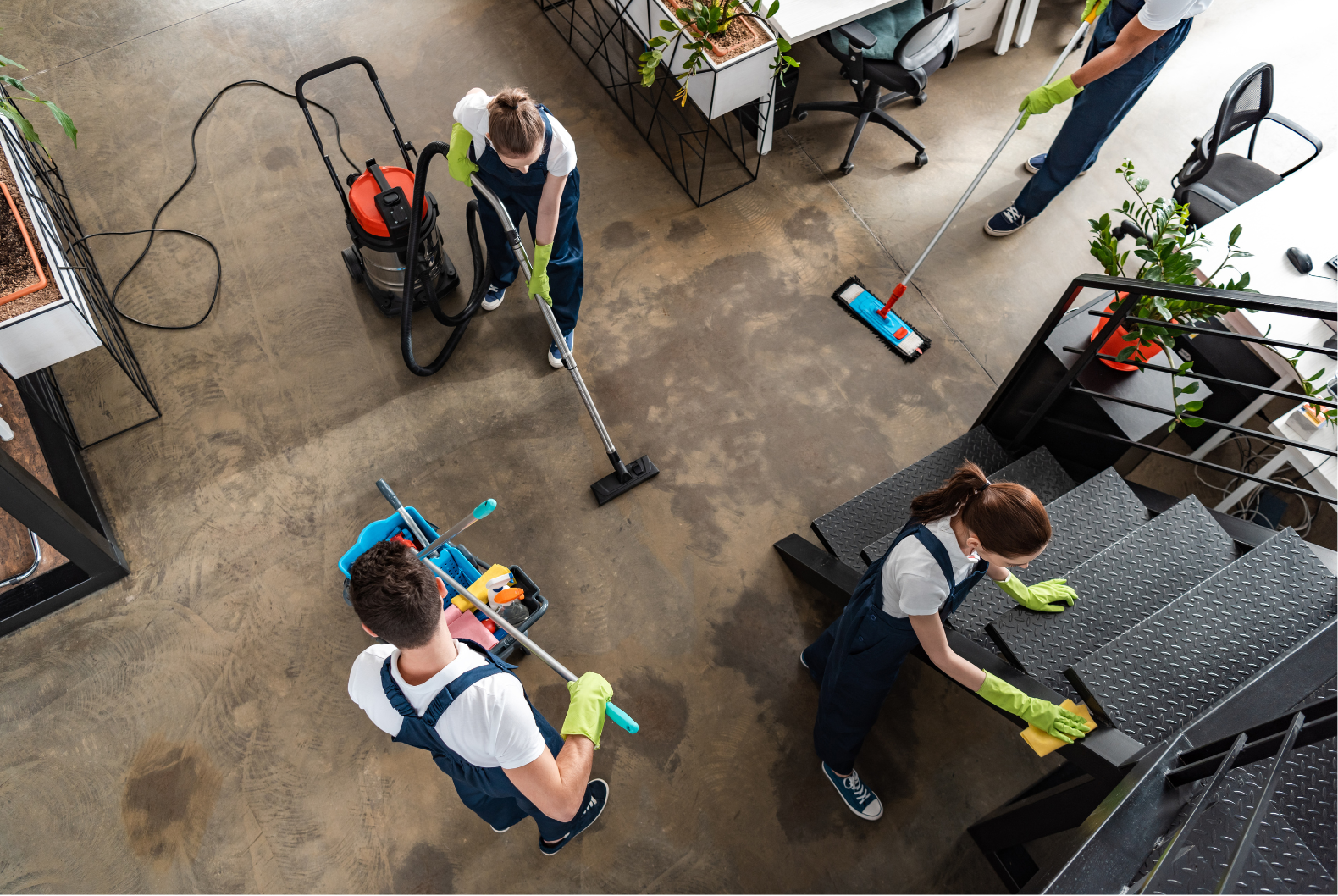 Builder sweeping the floor after renovation