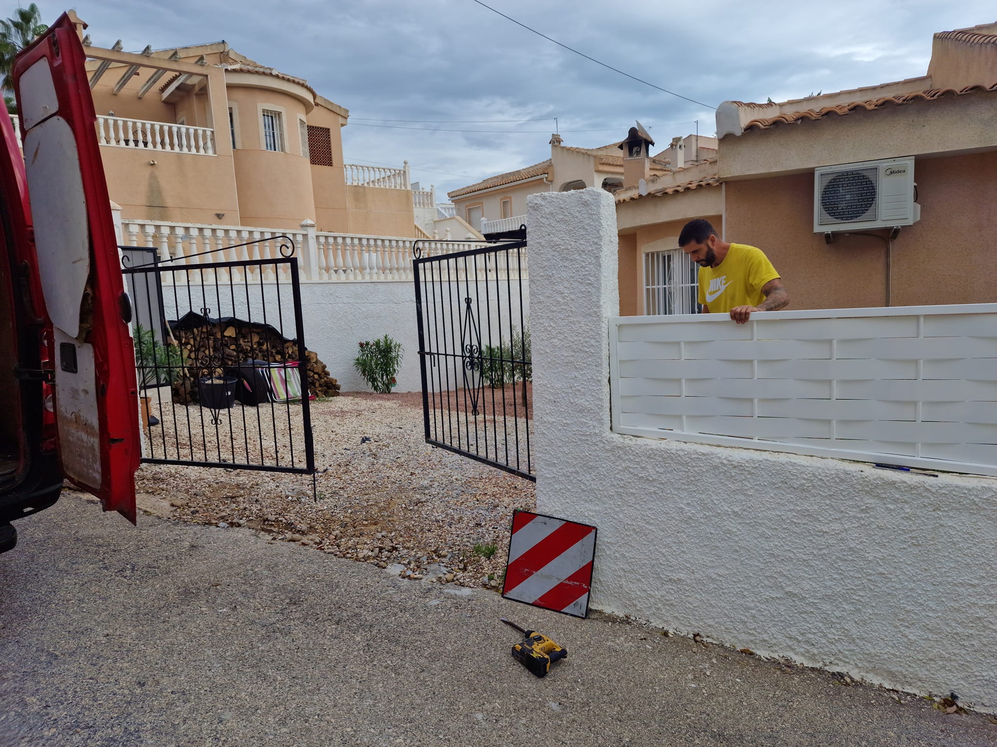 Metal fence installation view 1