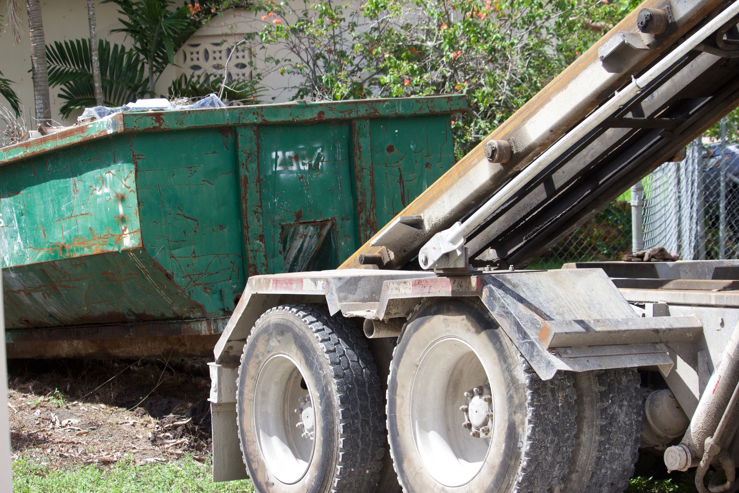 Construction site with roll-off dumpster