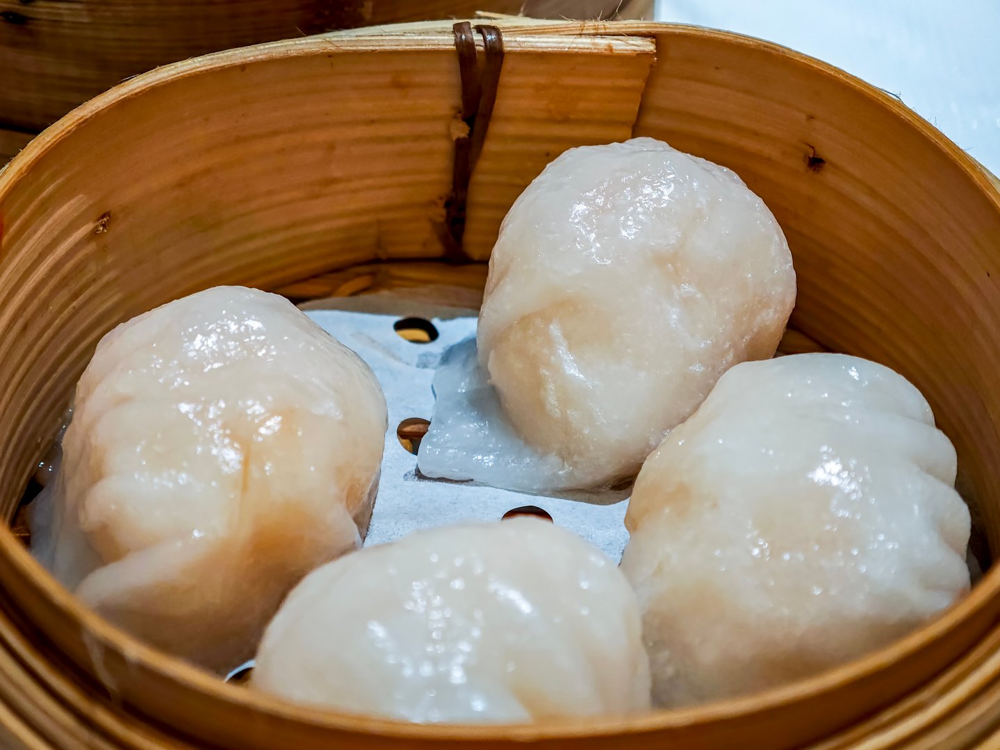 Traditional Chinese Crystal Shrimp Dumplings in bamboo steamer