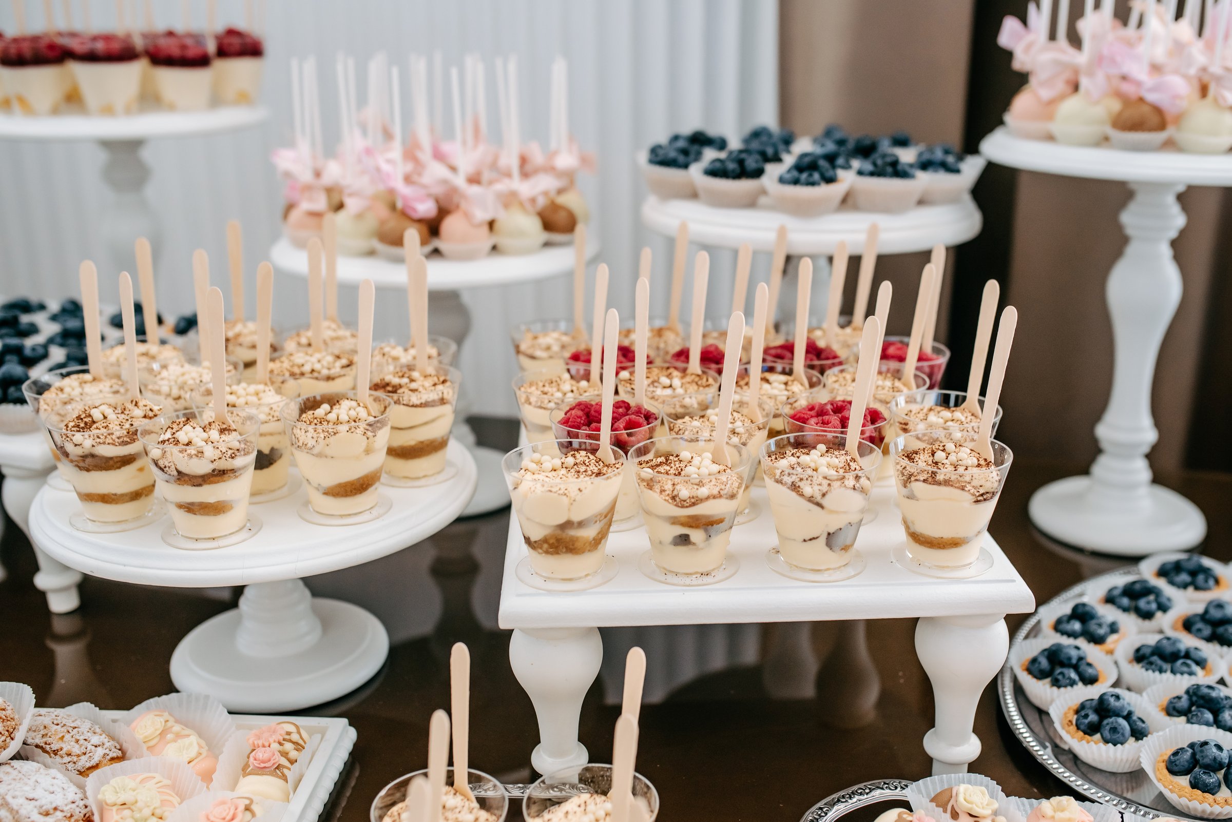 Candy bar from different cookies, candy and sweets at the wedding.