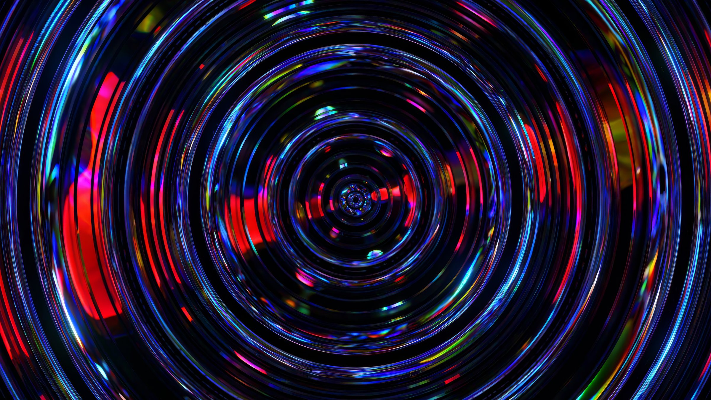 Colorful light patterns create a mesmerizing vortex, expanding and contracting in a seamless loop, perfect for visual backgrounds and artistic projects