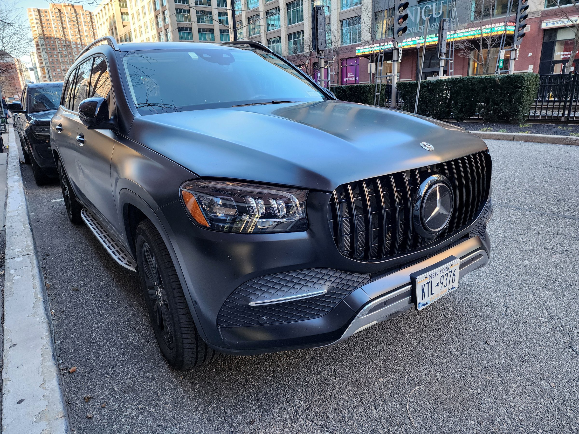New York City, USA - March 11, 2024: Mercedes Benz GL or GLS car luxury black color, corner view.