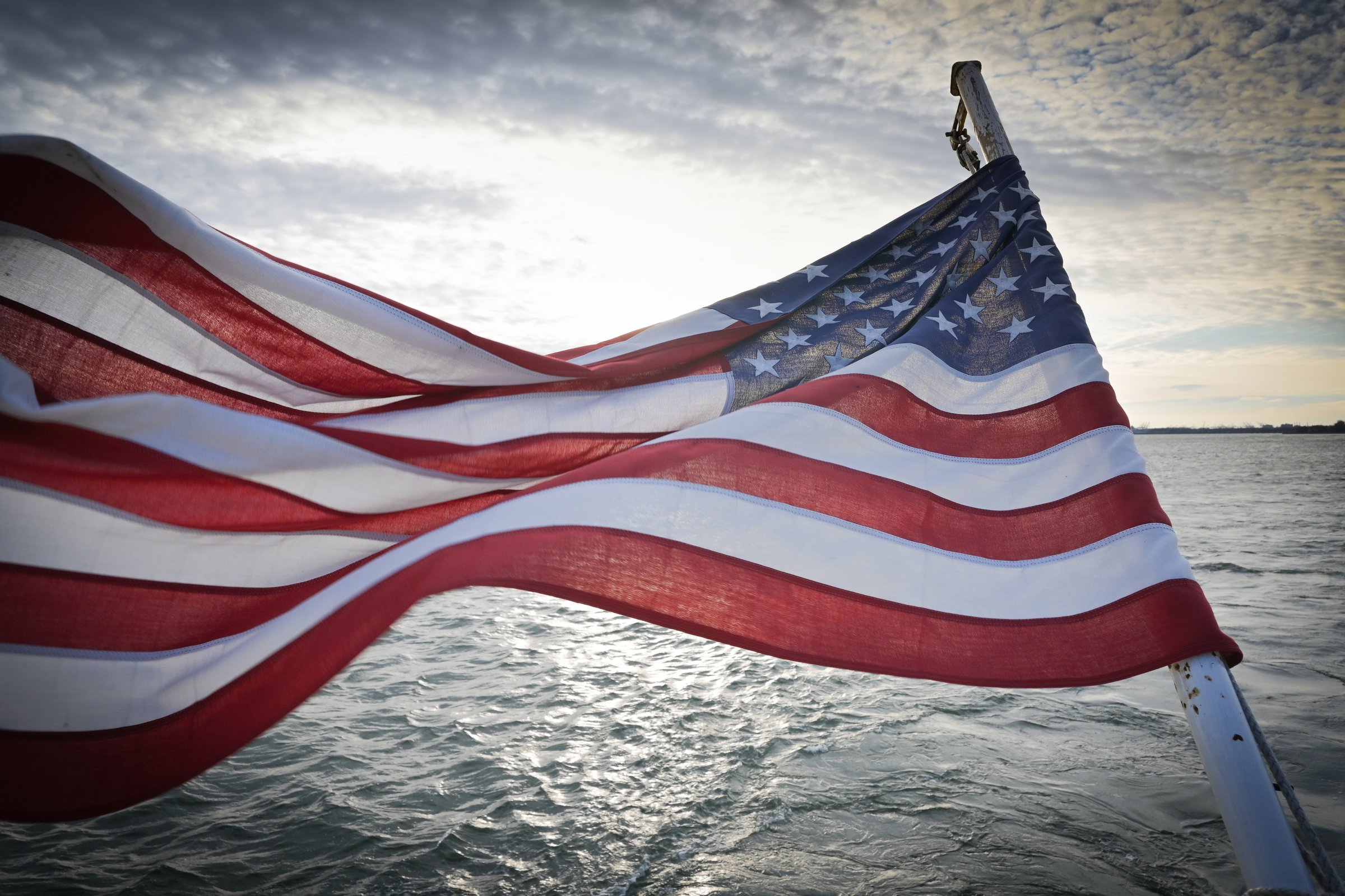 American flag over the water, New York