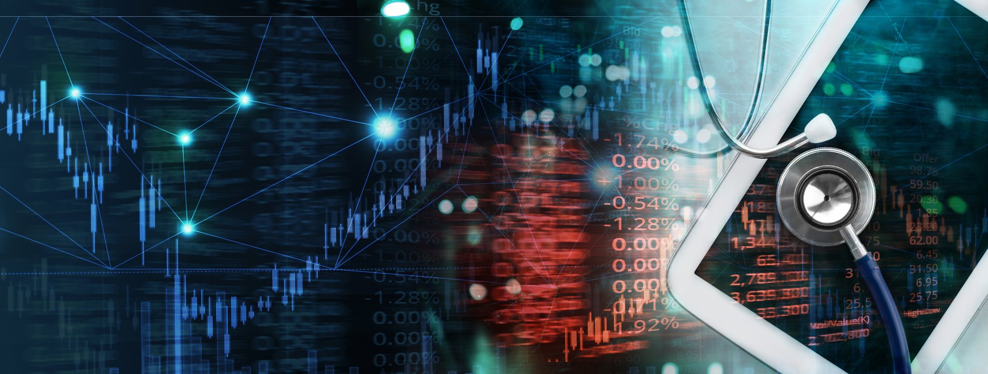stethoscope and tablet with stock market graph