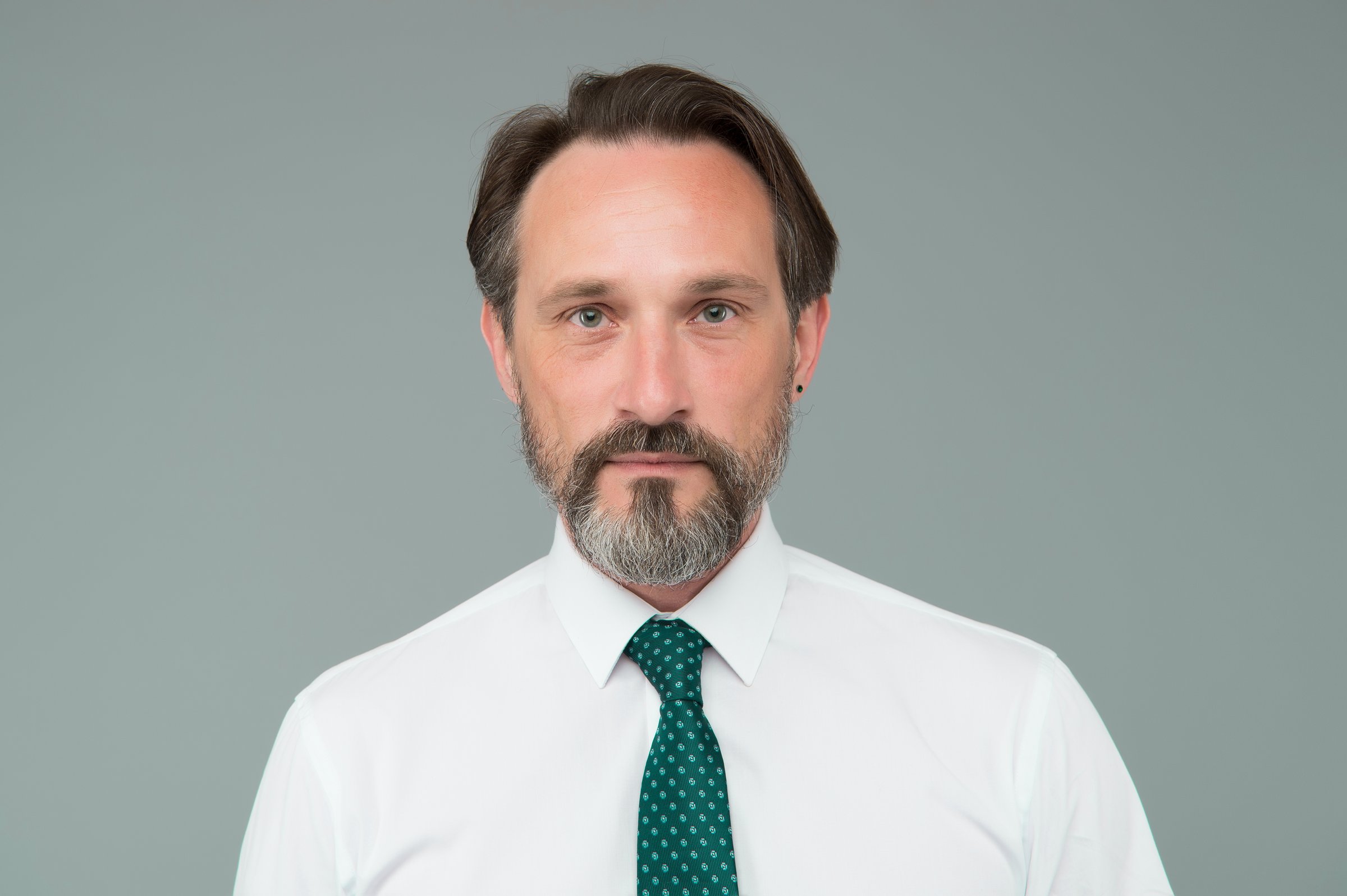 Example of classy. Man handsome confident mature fashion model wear fashionable white shirt. Sense of confidence. Gentlemen concept. Male fashion. Fashion shop. Mature face with beard close up.