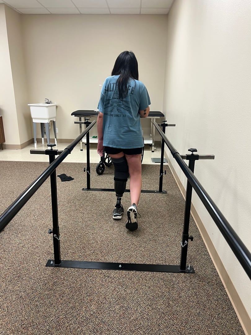 Angelie during her prosthetic fitting and consultation process