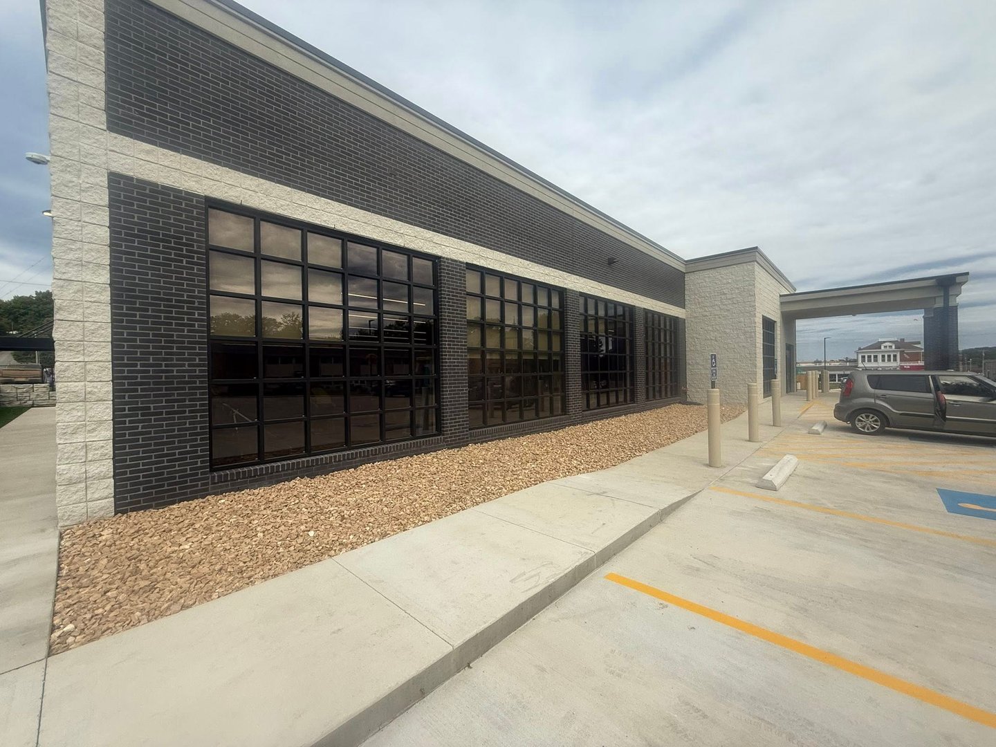 Dark bronze storefront windows installation