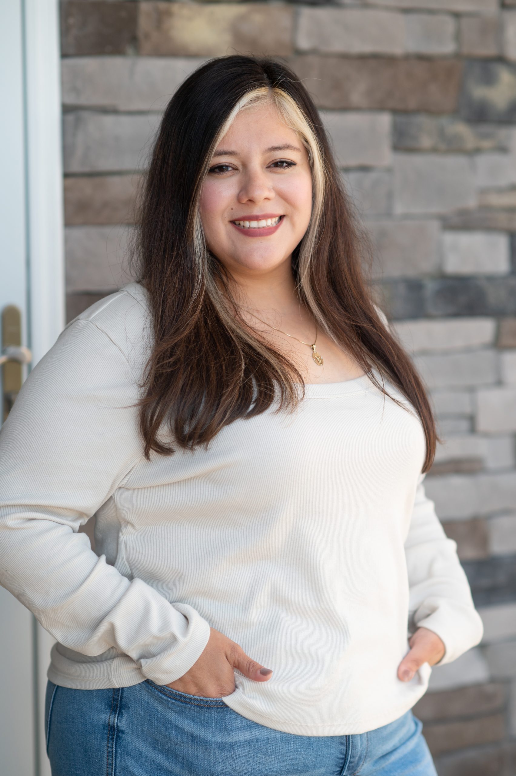 Professional headshot of Martha Huerta, experienced real estate agent