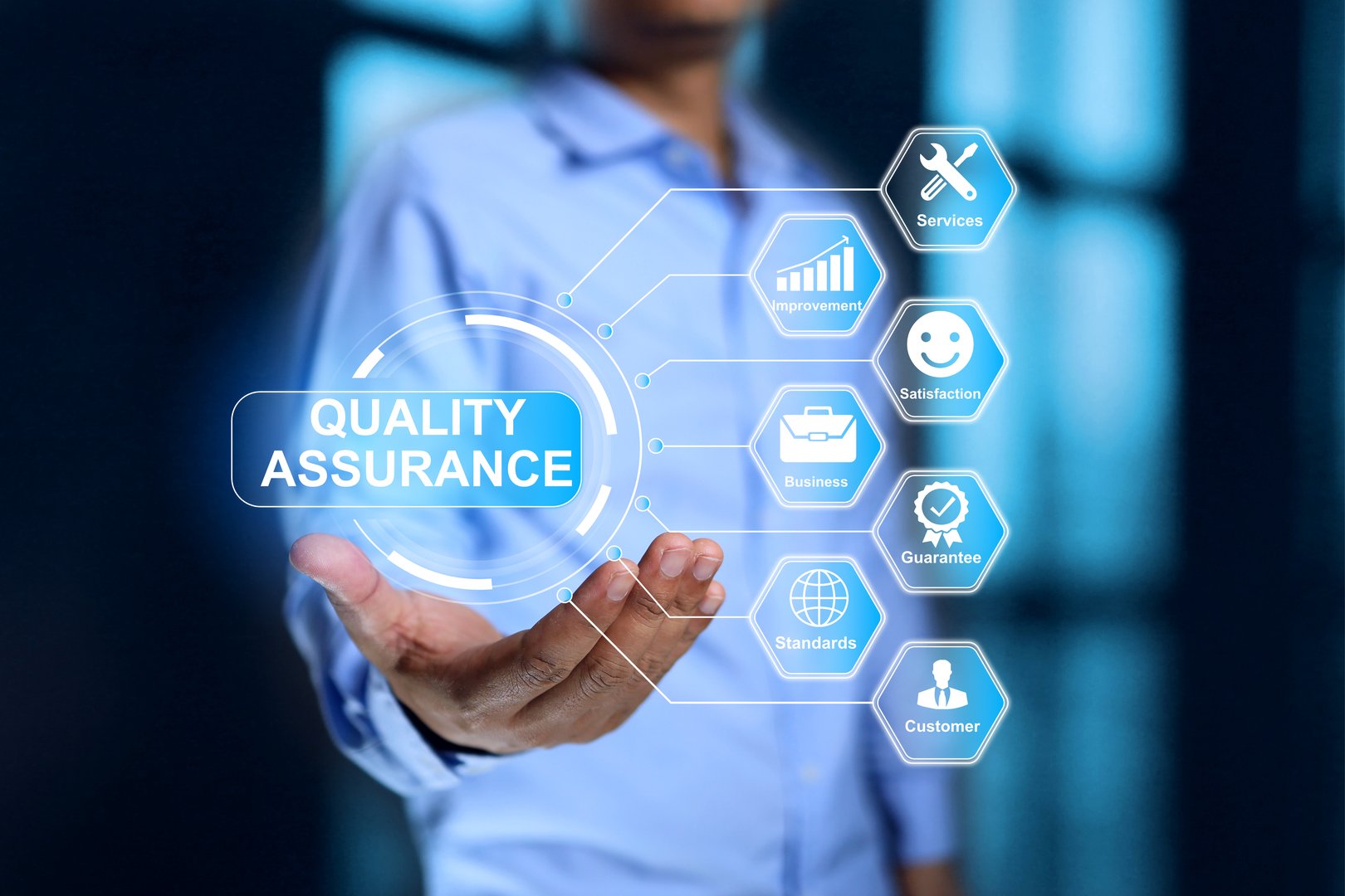 Quality assurance concept with businessman holding a systematic process to focused on preventing defects and ensuring products or services consistently to meet customer specified requirements