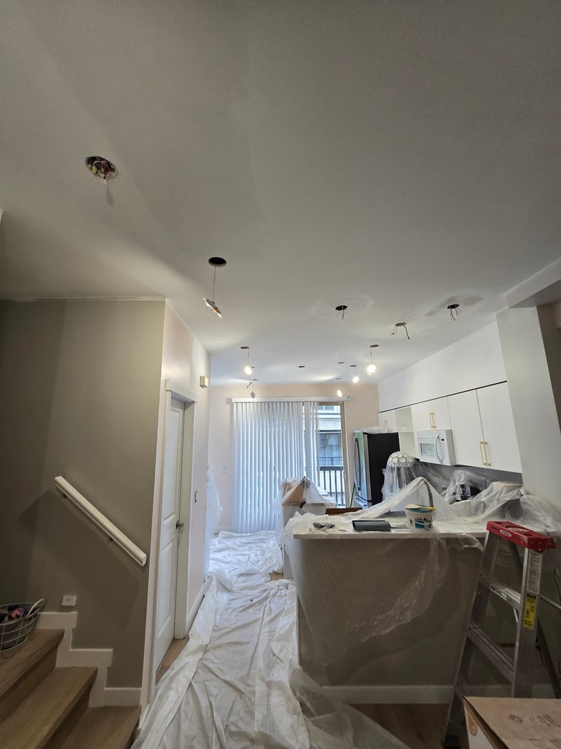 Before work - back half of main living area going to kitchen