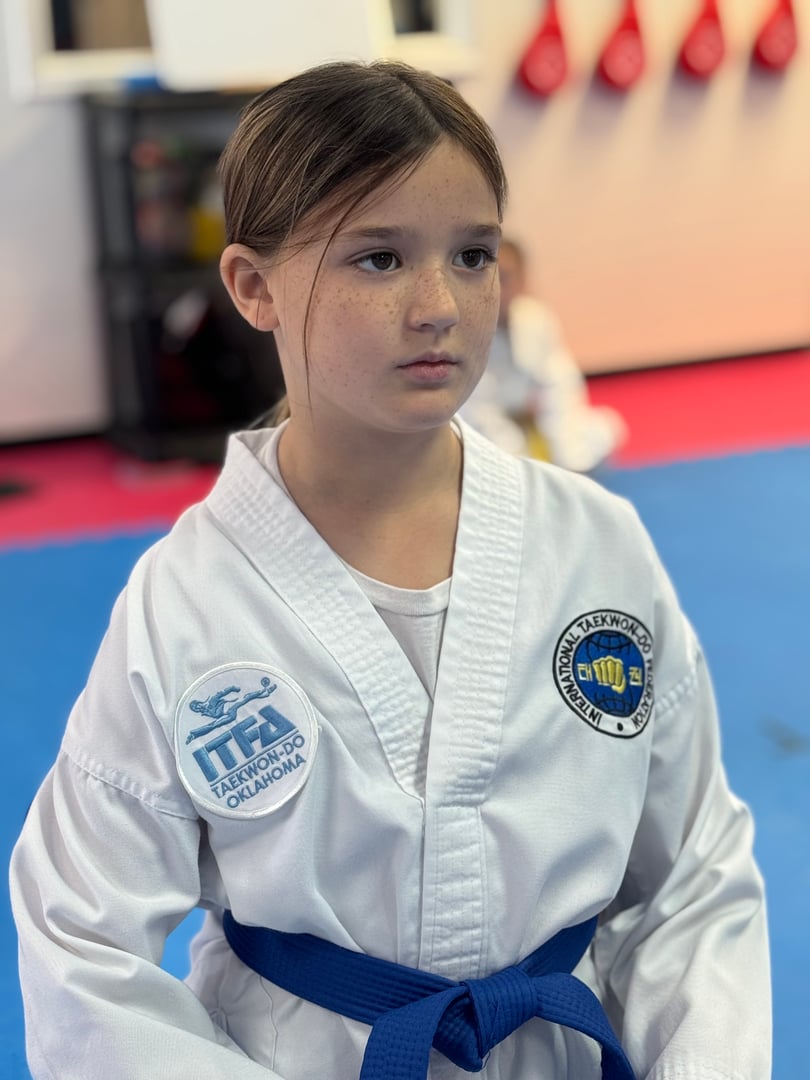 Students learning martial arts techniques