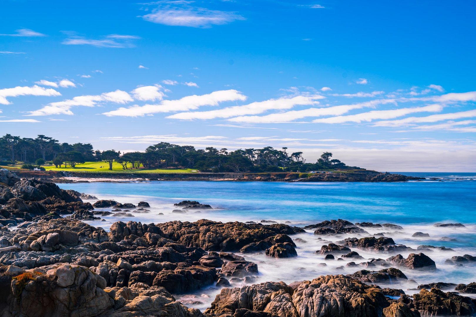 Pebble Beach Golf Course, offering breathtaking views of the Pacific Coast.