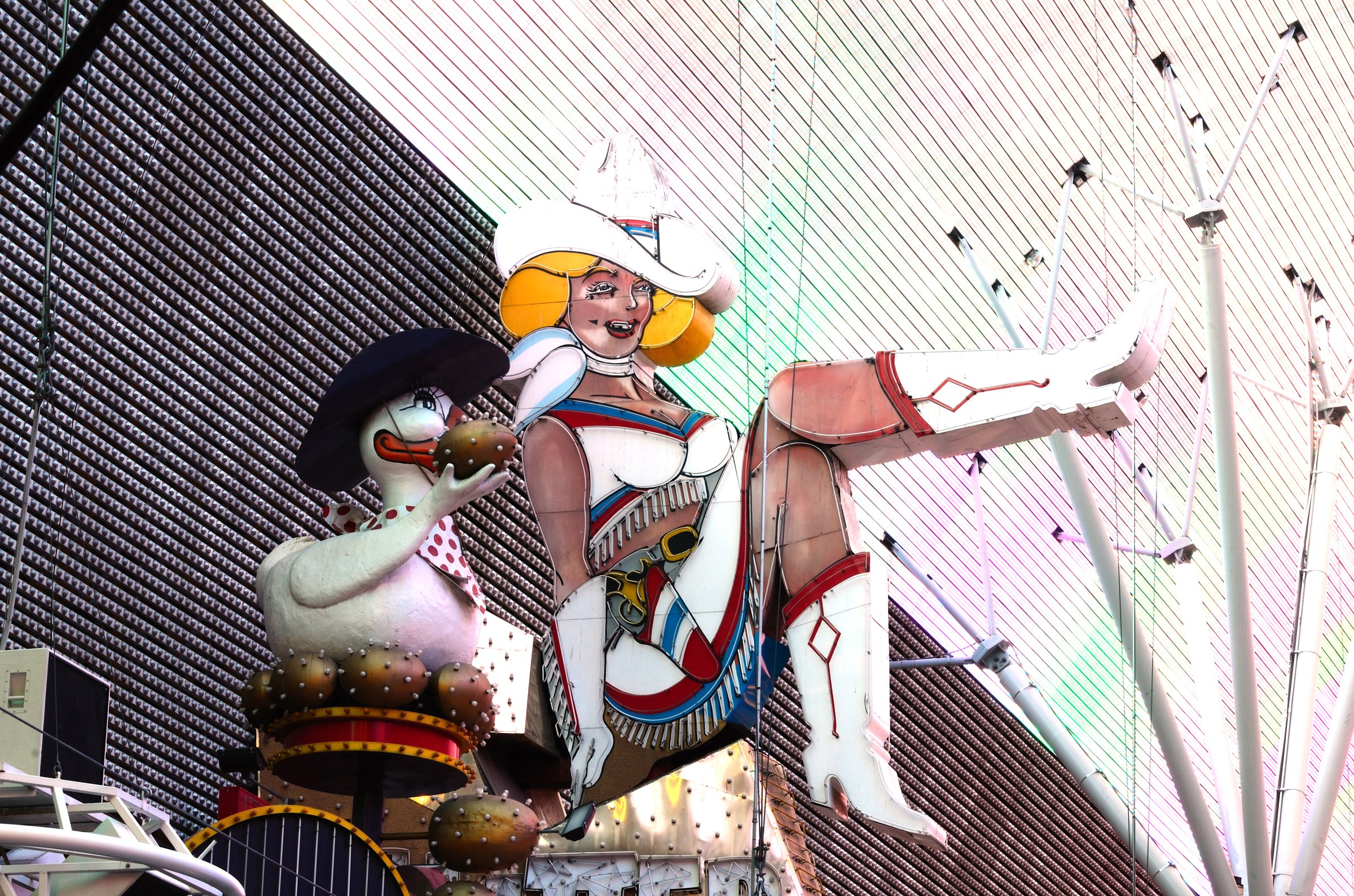 Las Vegas, USA - December 08, 2011: Glitter Gulch Kicking Cowgirl sign on display on Fremont Street, Las Vegas Nevada, USA