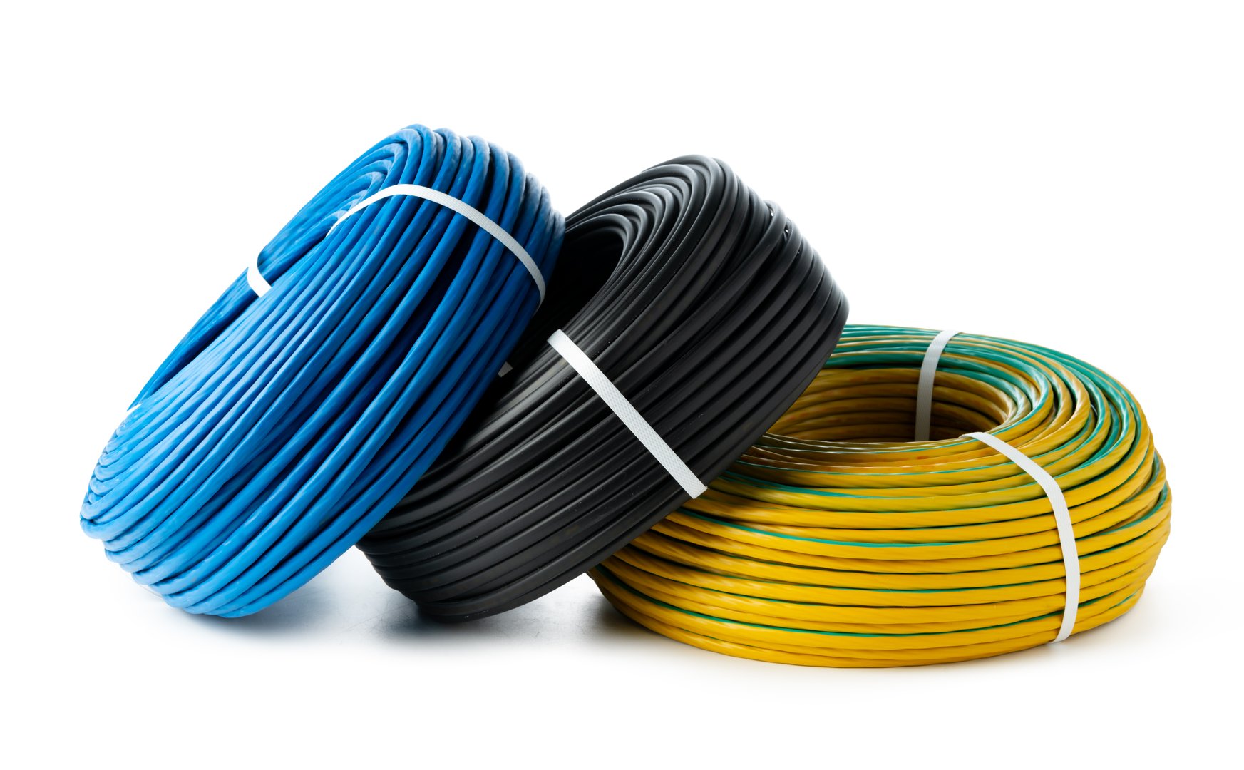 This image shows three rolls of electrical wire, one blue, one black, and one yellow with a green stripe, isolated on a white background