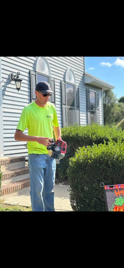 Brian Mrozinski working on landscaping project