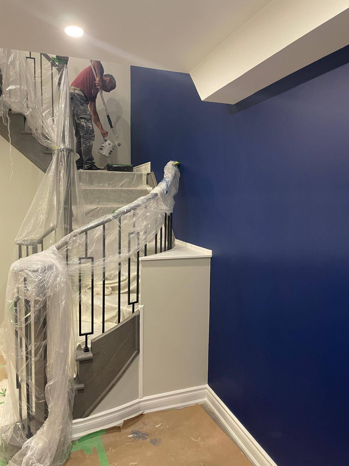 Deep blue accent wall transformation by VS House Paint