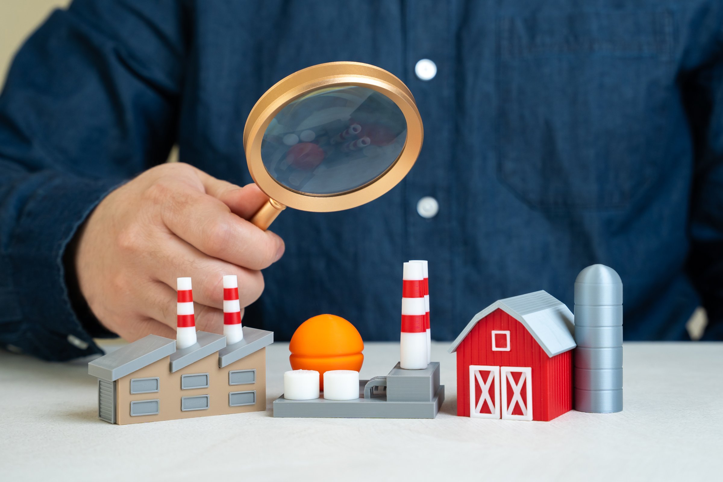 A man explores sectors of the economy. Analysis of economic structure, industrial contributions to GDP, or identifying growth areas.