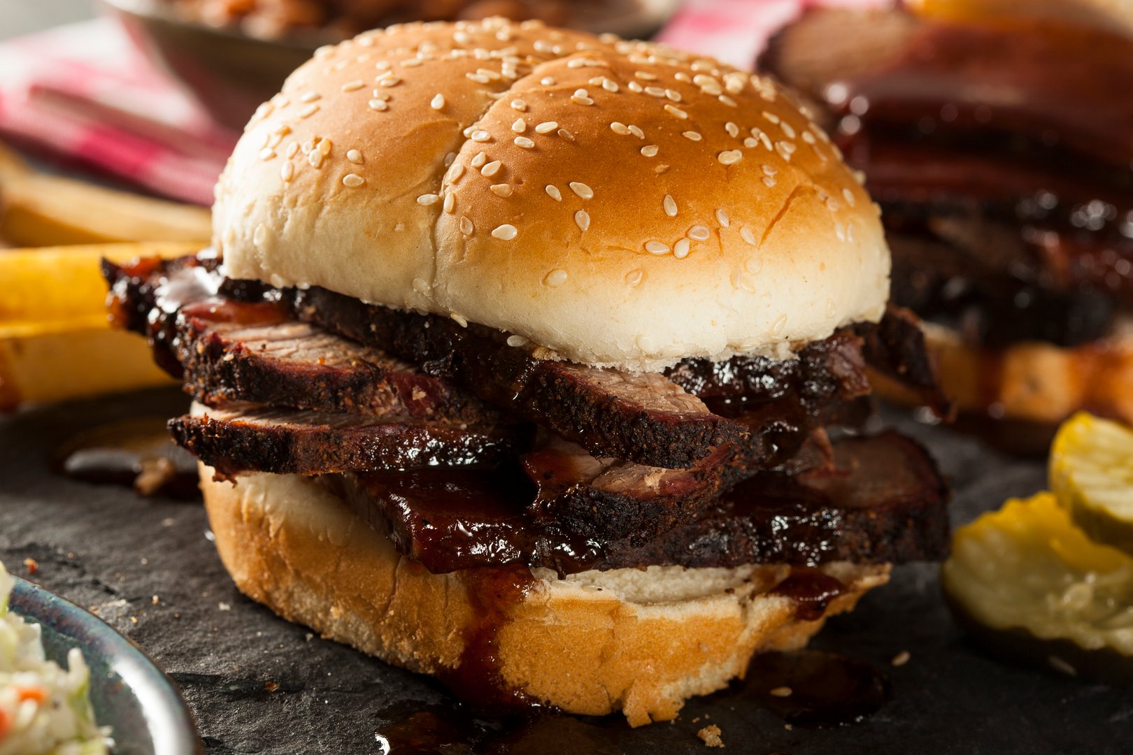 Smoked Barbecue Brisket Sandwich with Coleslaw and Bake Beans
