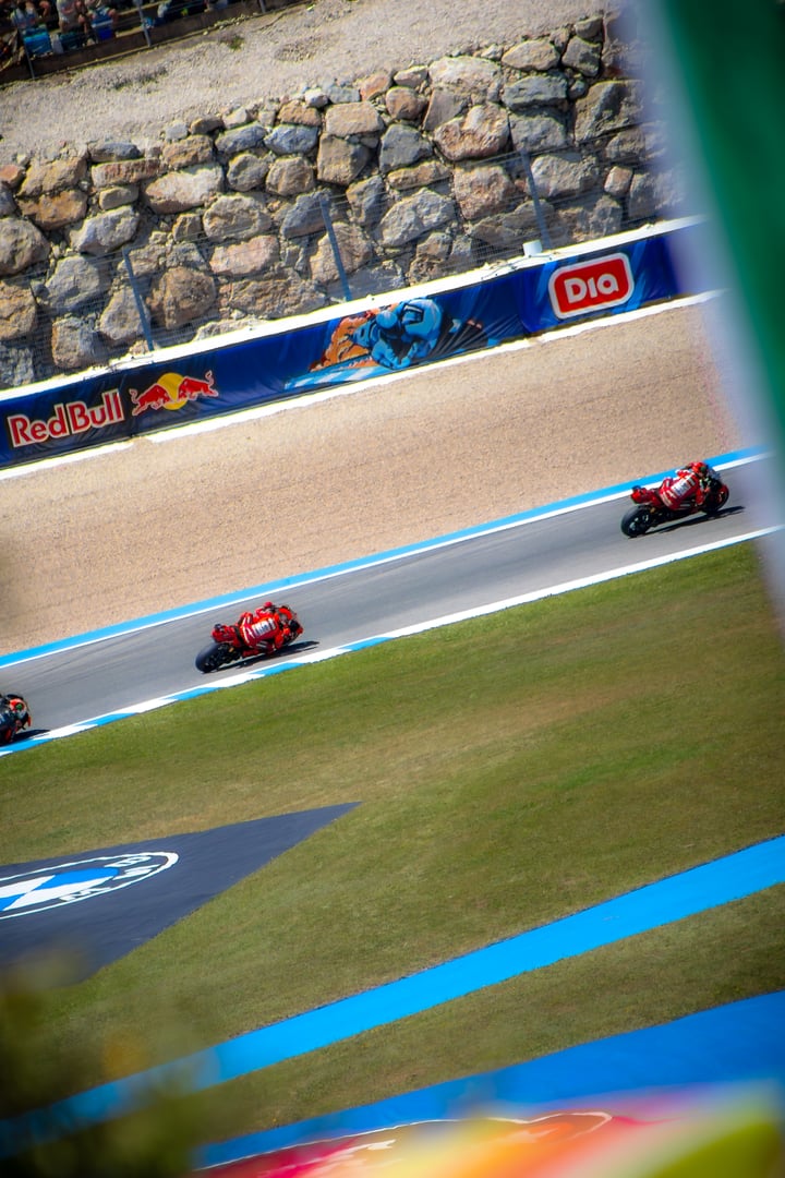 Marc Marquez and Bagnaia riding in Nieto-Peluqui's corner